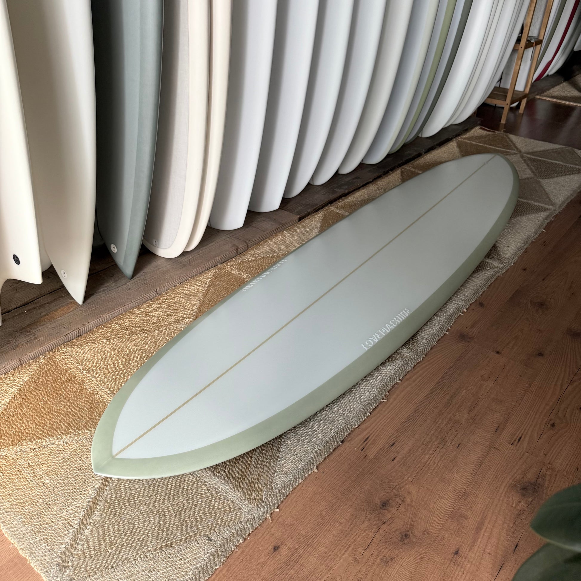 LOVEMACHINE SURFBOARDS 7'6" Thick Lizzy smoothing by Ryan Lovelace